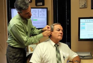 Dr. Wade S. Zarella AUD., CCC-A hearing aid fitting